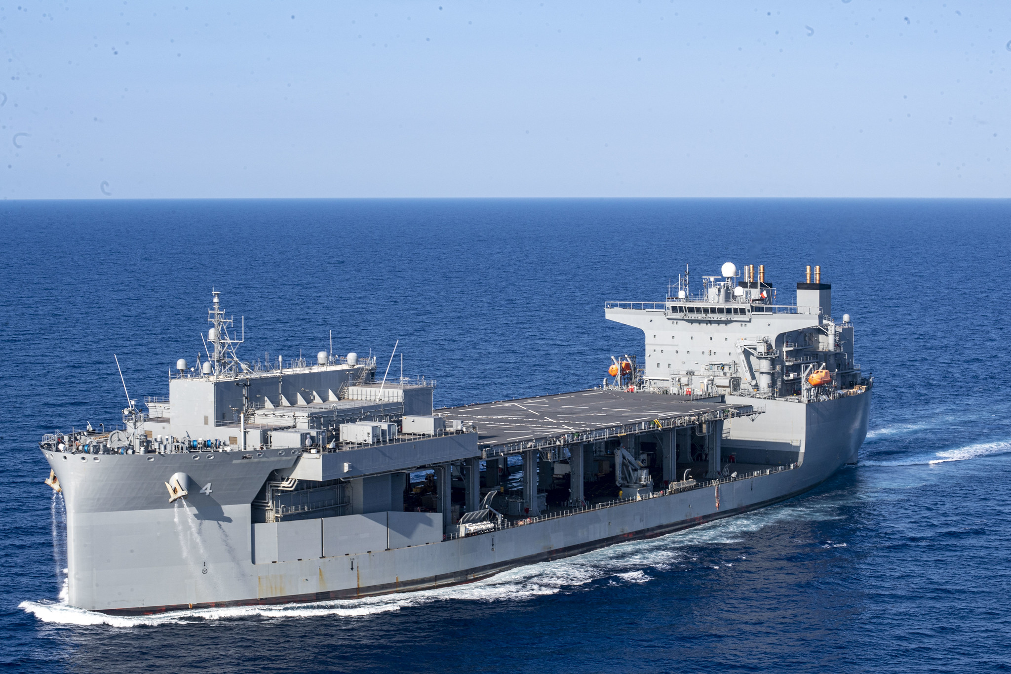 The expeditionary sea base USS Hershel "Woody" Williams (ESB 4) participates in a photo exercise in the Mediterranean Sea, Aug. 20, 2020.