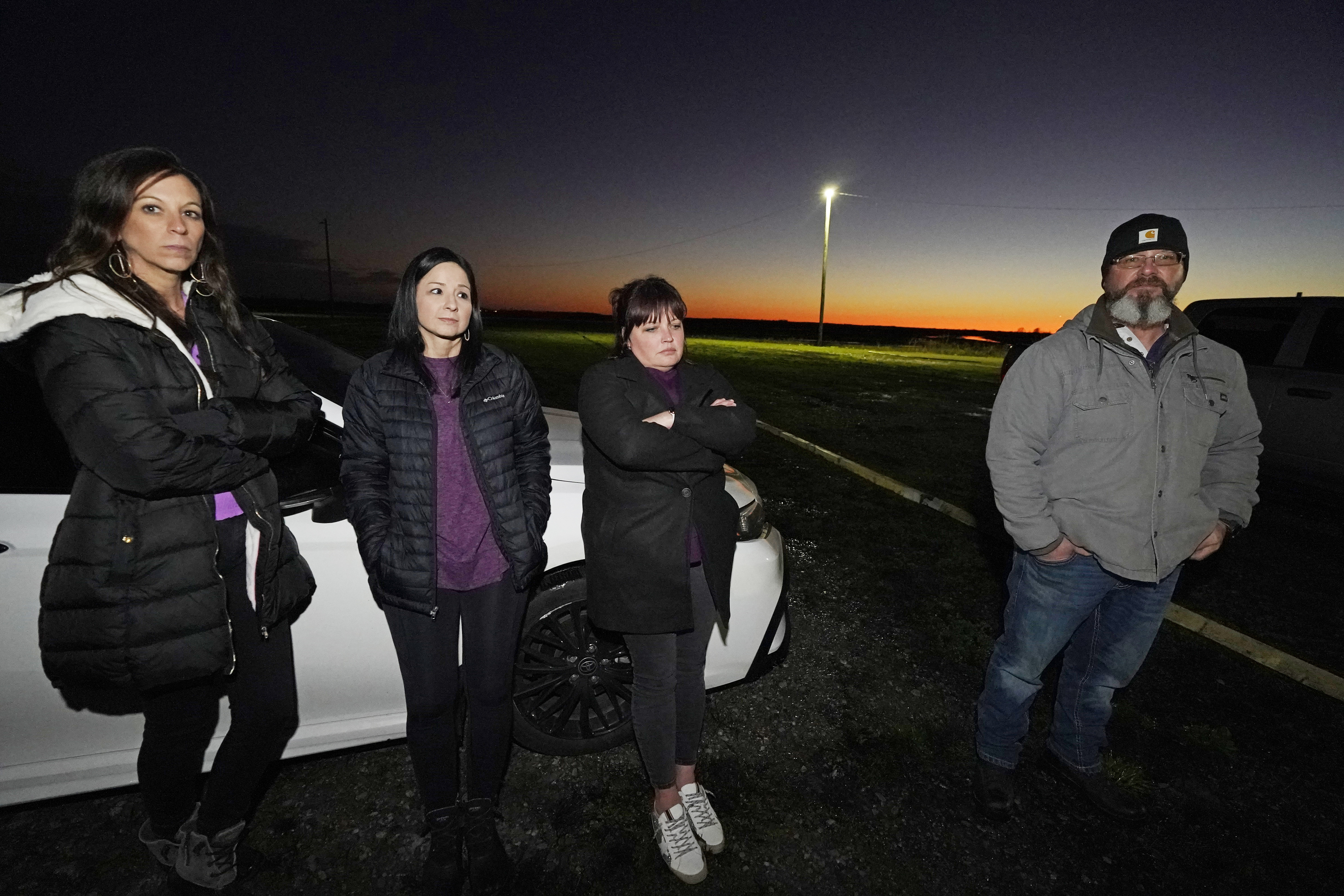 A small group of people gather in support of the mother and family of Leesa Marie Gray, who at age 16 was raped and murdered by Thomas Edwin Loden Jr., who was executed late Wednesday, Dec. 14, 2022, at the Mississippi State Penitentiary in Parchman, Miss.